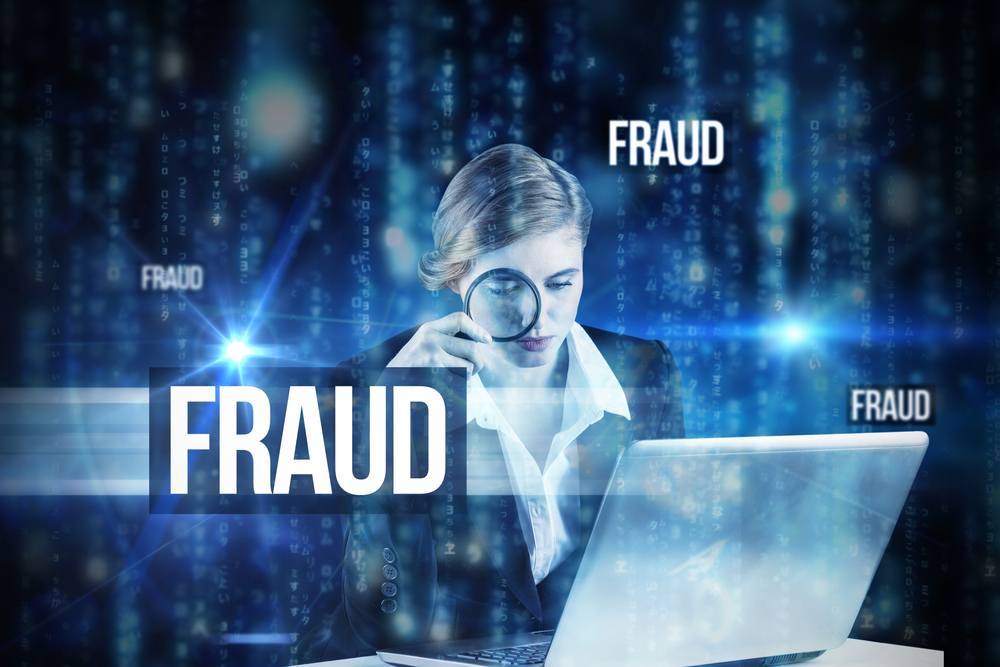 The,Word,Fraud,And,Redhead,Businesswoman,Using,Her,Laptop,Against