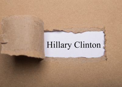 Hillary Clinton Called Donald Trump Reckless on the Same Day Iran Begged Him for a Ceasefire Torn,Paper,Box,With,Word,Hillary,Clinton,On,White,Background.