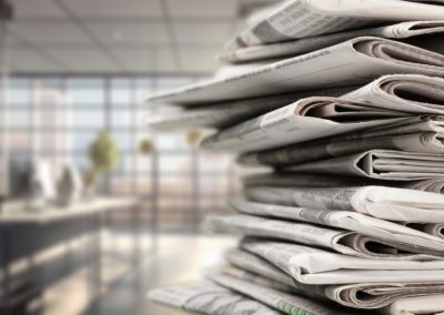 Many,Newspapers,As,Background,In,Modern,Office