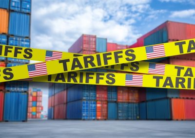 Chuck Schumer Said Donald Trump Lost on Tariffs and Woke Up to 60 Countries Paying the Price Tariffs,Warning,Signs,Near,Colorful,Shipping,Containers,In,A,Busy